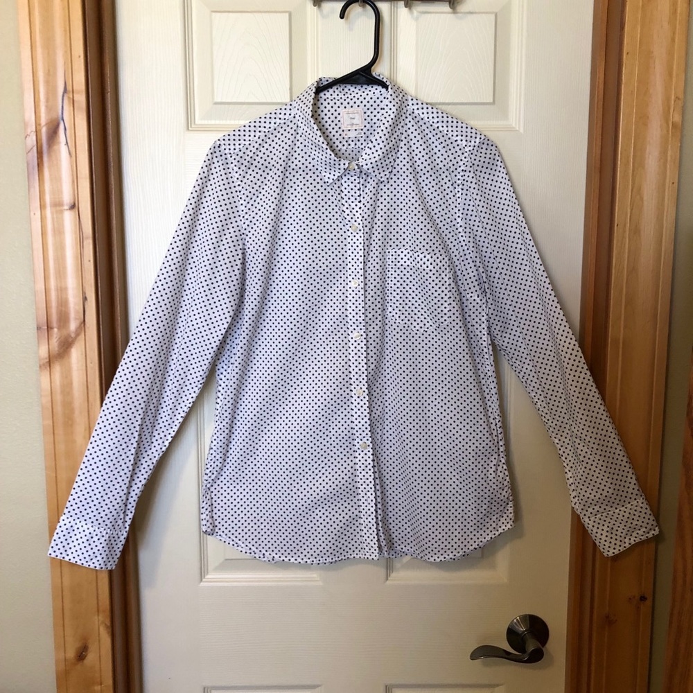 Navy polka dot blouse.